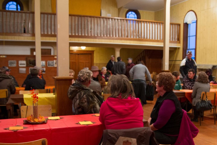 a group of people sitting at a table